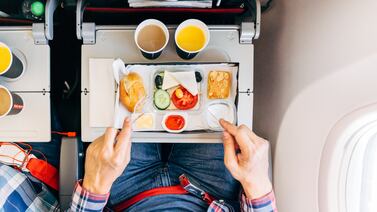 An Iata report found airline passengers generate about 1.43kg of waste per flight, 20 per cent of which is untouched food and drinks. Getty Images