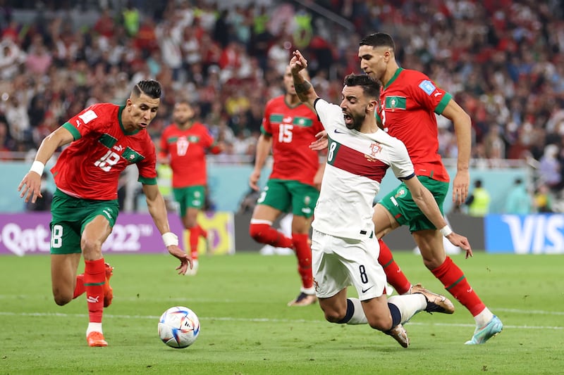 Portugal's Bruno Fernandes goes down in the box but no penalty was given. Getty