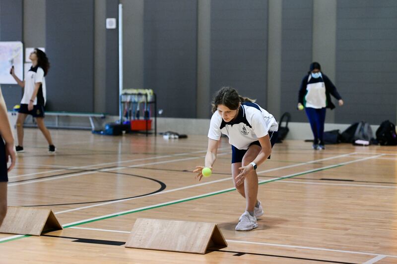 Pupils at Repton Abu Dhabi play the gutter board game. The school has introduced unconventional sports to fight obesity in children. All photos: Khushnum Bhandari / The National