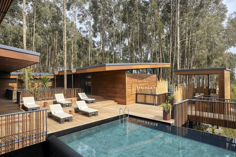 The resort is set among wild Rwandan gardens and has an infinity pool with views facing the flora.