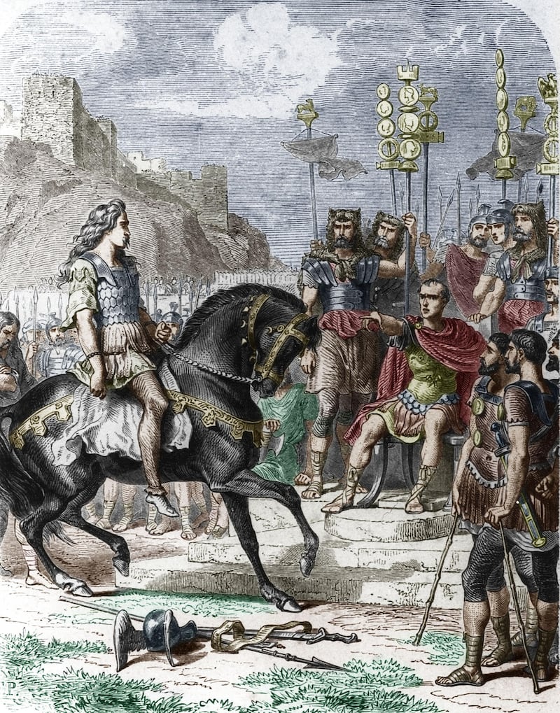UNSPECIFIED - NOVEMBER 22:  gallic leader Vercingetorix (72-46) after his defeat laying down his arms to the emperor Julius Caesar after the battle of Alesia 52 BC , engraving by Trichon and Chapon 19th century  (Photo by Apic/Getty Images)