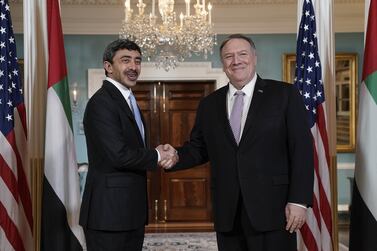 Foreign Minister Abdullah bin Zayed bin Sultan Al Nahyan of the United Arab Emirates, left, is welcomed by Secretary of State Mike Pompeo for a meeting at the State Department in Washington, Friday, Nov. 22, 2019. (AP Photo/J. Scott Applewhite)