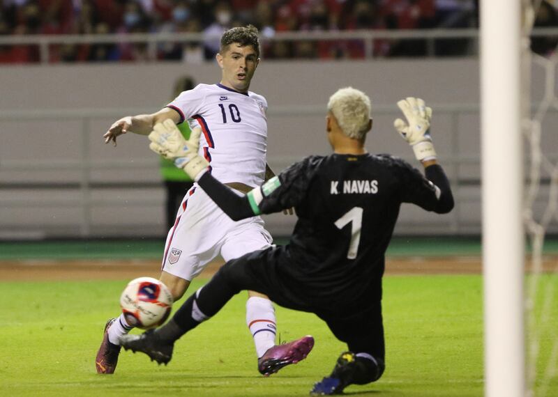 Christian Pulisic of the US challenges Costa Rica goalkeeper Keylor Navas. Reuters