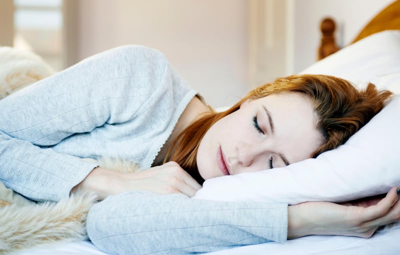 A woman asleep in bed (Getty Images) *** Local Caption ***  al15ma-health-sleep.jpg