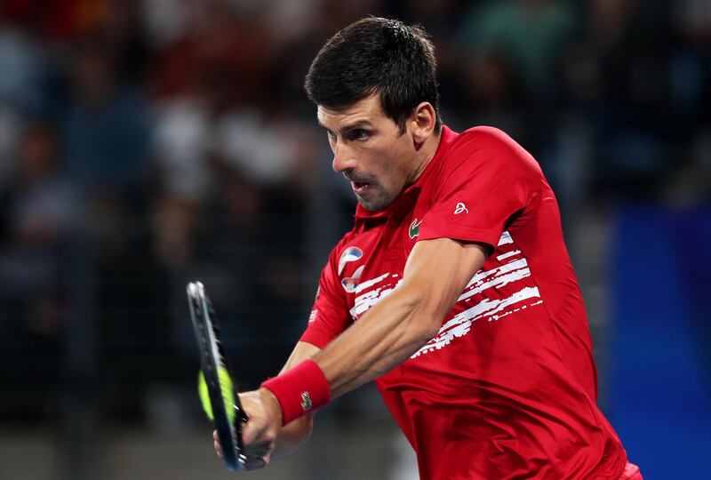 SYDNEY, AUSTRALIA - JANUARY 12: Novak Djokovic of Serbia plays a backhand during his final singles match against Rafael Nadal of Spain during day 10 of the ATP Cup at Ken Rosewall Arena on January 12, 2020 in Sydney, Australia. (Photo by Matt King/Getty Images)