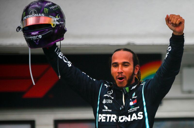 Mercedes driver Lewis Hamilton celebrates winning the Hungarian Grand Prix on July 19, 2020.  EPA
