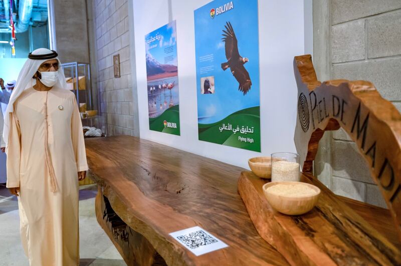 Sheikh Mohammed bin Rashid, Vice President and Ruler of Dubai, tours the Bolivia pavilion in the Sustainability District at Expo Dubai 2020. The condor is Bolivia's national bird.