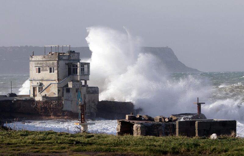Waves breaking against a building on the shore in the northern Lebanese seaside town of Anfeh, 65 Kms north of Beirut. AFP