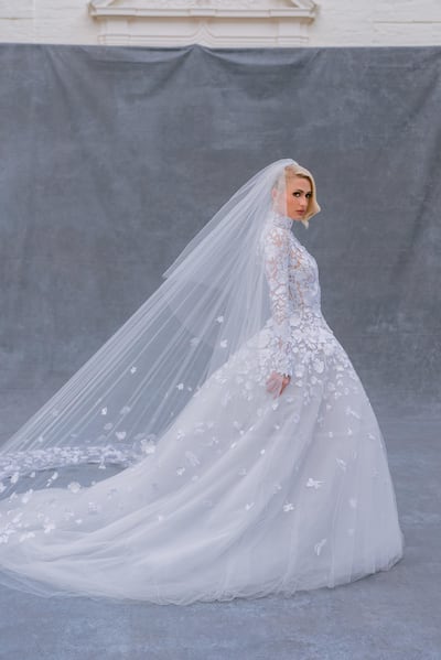 Paris Hilton says she spent months creating the wedding dress with Oscar de la Renta designers Fernando Garcia and Laura Kim. Jose Villa / Shutterstock