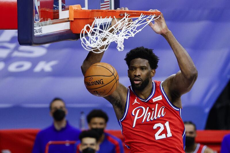 PHILADELPHIA, PENNSYLVANIA - MARCH 03: Joel Embiid #21 of the Philadelphia 76ers dunks during the fourth quarter against the Utah Jazz at Wells Fargo Center on March 03, 2021 in Philadelphia, Pennsylvania. NOTE TO USER: User expressly acknowledges and agrees that, by downloading and or using this photograph, User is consenting to the terms and conditions of the Getty Images License Agreement.   Tim Nwachukwu/Getty Images/AFP
== FOR NEWSPAPERS, INTERNET, TELCOS & TELEVISION USE ONLY ==
