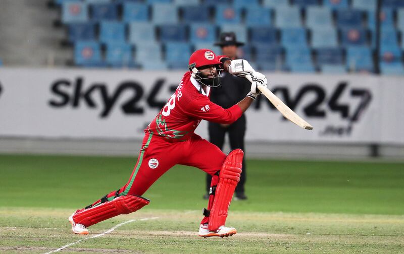 Khawar Ali of Oman plays a shot.