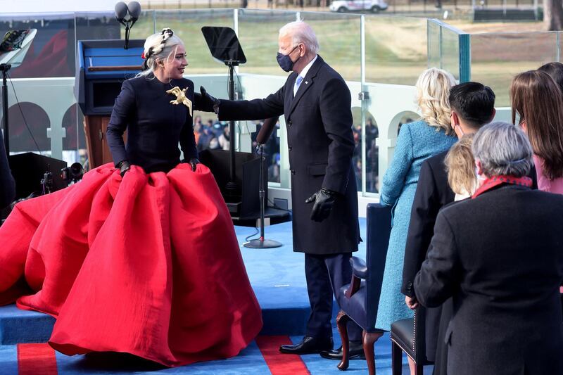 Singer Lady Gaga is greeted by President-elect Joe Biden during the inauguration of Biden as the 46th President of the United States on the West Front of the US Capitol in Washington, on January 20, 2021. Reuters