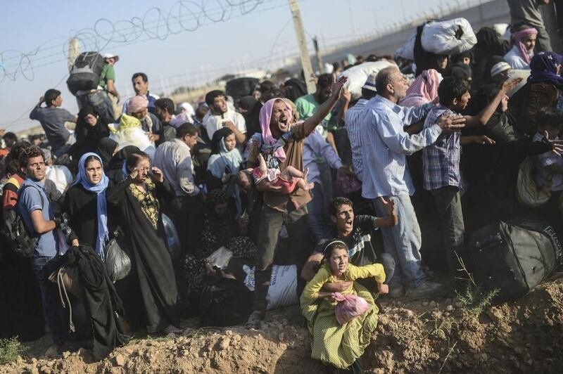 It said it would only allow them into the country in the event of a humanitarian tragedy. Bulent Kilic/AFP Photo