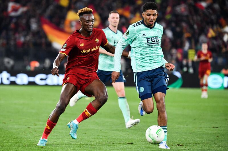 Roma's British forward Tammy Abraham (L) fights for the ball with Leicester's French]defender Wesley Fofana during the UEFA Conference League semi-final second leg football match between AS Roma and Leicester City at The Olympic Stadium in Rome, on May 5, 2022.  (Photo by Isabella BONOTTO  /  AFP)