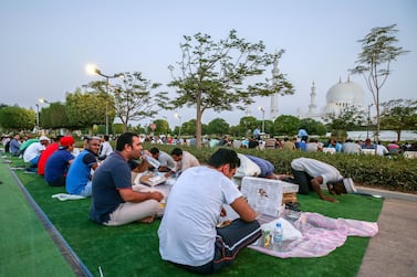 Muslims break their fast at Sheikh Zayed Grand Mosque in Abu Dhabi. Victor Besa / The National 