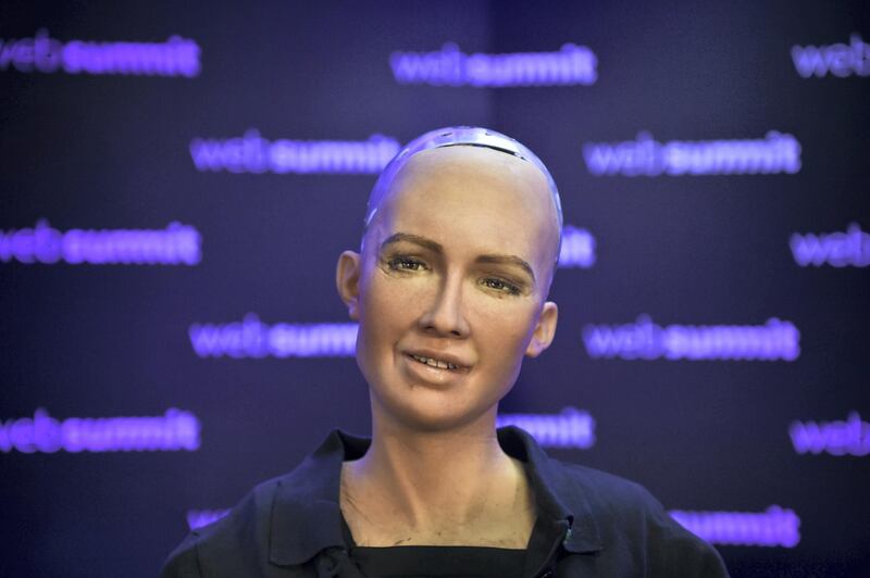Humanoid "Sophia The Robot" of Hanson Robotics answers questions during a press conference at the 2017 Web Summit in Lisbon on November 7, 2017. 
Europe's largest tech event Web Summit is held at Parque das Nacoes in Lisbon from November 6 to November 9.  / AFP PHOTO / PATRICIA DE MELO MOREIRA