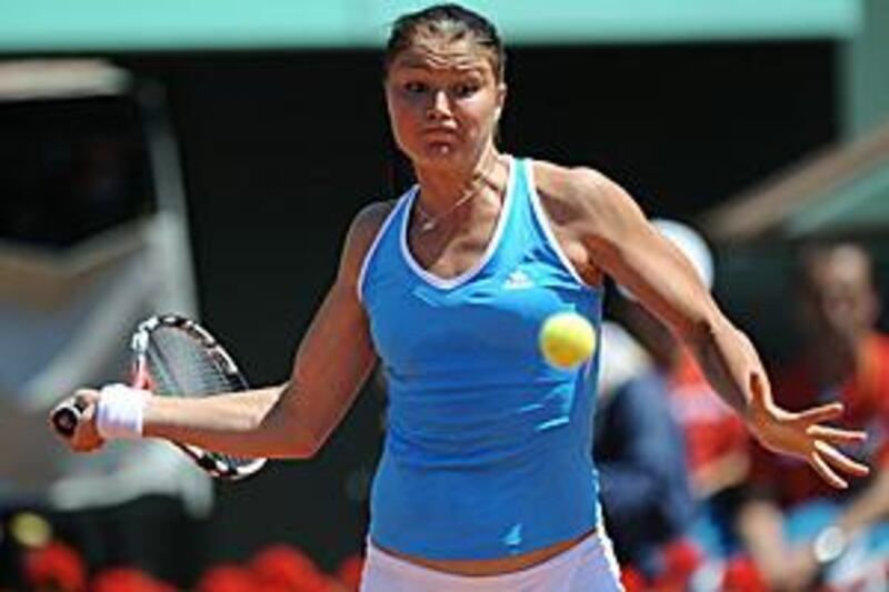 Dinara Safina sets herself to unleash a forehand during her rout of her French opponent. The Russian lost only one game.