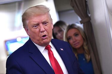 US President Donald Trump onboard Air Force One on Thursday. AFP