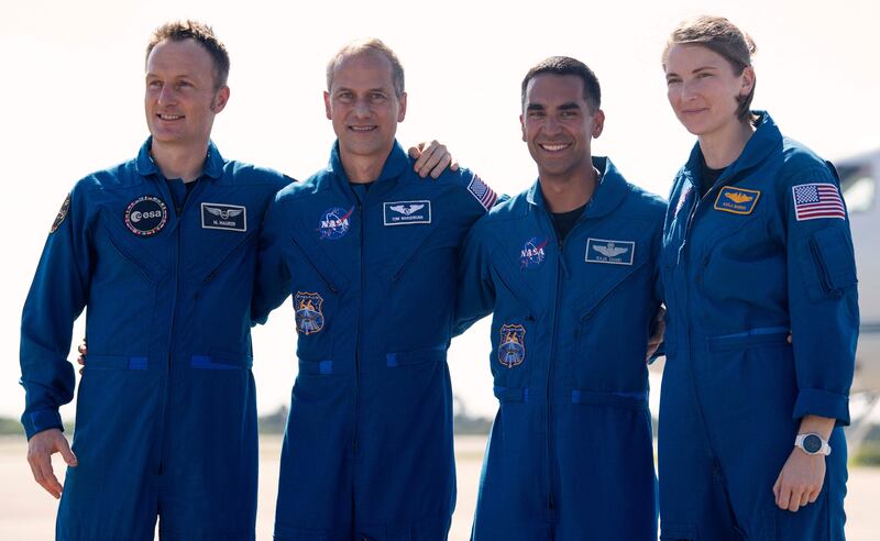 The astronauts looked relaxed as they arrived at the Kennedy Space Centre. AFP