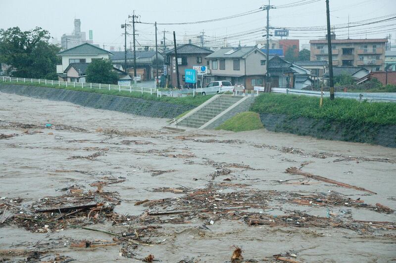 Rising water caused by heavy rain is seen at Kuma river in Yatsushiro, Kumamoto prefecture. AFP