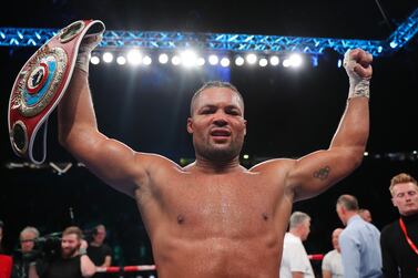 MANCHESTER, ENGLAND - SEPTEMBER 24: Joe Joyce celebrates with the Vacant WBO Interim World Heavyweight Championship belt after defeating Joseph Parker in the Vacant WBO Interim World Heavyweight Championship fight between Joe Joyce and Joseph Parker at AO Arena on September 24, 2022 in Manchester, England. (Photo by Alex Livesey / Getty Images)