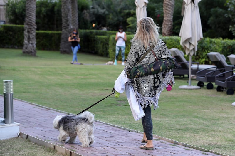 DUBAI, UNITED ARAB EMIRATES , October 28– 2020 :- Danielle Nay with her puppy Freeway arriving to attend the Puppy Pilates class held at Bounty Beets Café at the Le Méridien Mina Seyahi Beach Resort & Marina in Dubai. (Pawan Singh / The National) For Lifestyle/Online/Instagram. Story by Sophie