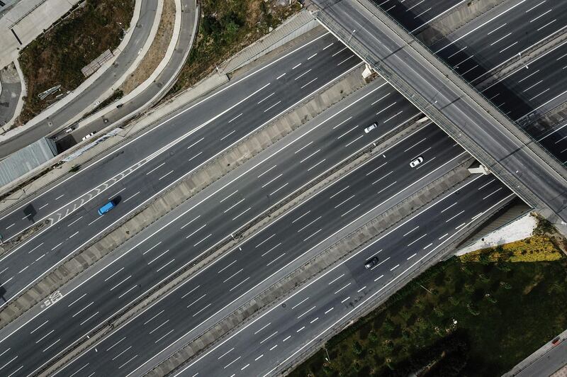 An aerial view shows nearly empty motorway leading to Fatih Sultan Mehmet bridge which connects Europe with Asia, in Turkey.   AFP