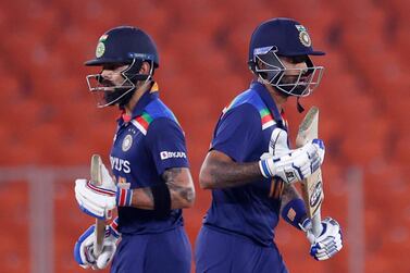 Cricket - Fifth Twenty20 International - India v England - Narendra Modi Stadium, Ahmedabad, India - March 20, 2021 India's Virat Kohli and Suryakumar Yadav in action REUTERS/Danish Siddiqui