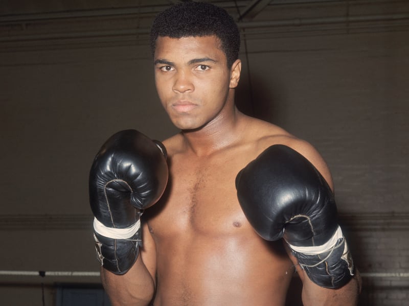 More than two dozen painting by legendary boxer Muhammad Ali sold for nearly $1 million in auction. Getty Images