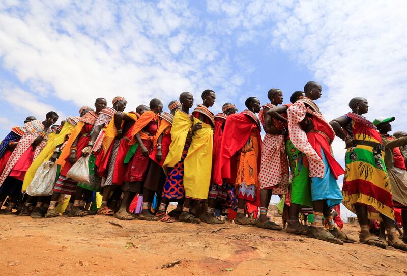 Samburu tribes queue to receive relief meat in a programme by the Kenyan government and the Red Cross to buy livestock, slaughter and distribute it as food to affected families after prolonged drought, near Lengusaka in Wamba, Kenya. Reuters