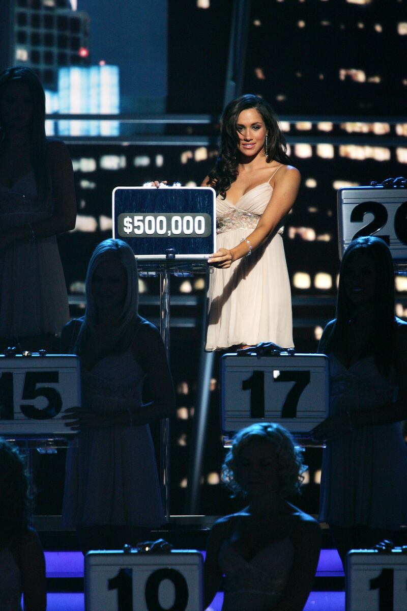 Meghan while working as a host on American quiz show 'Deal Or No Deal' in 2006. Getty Images