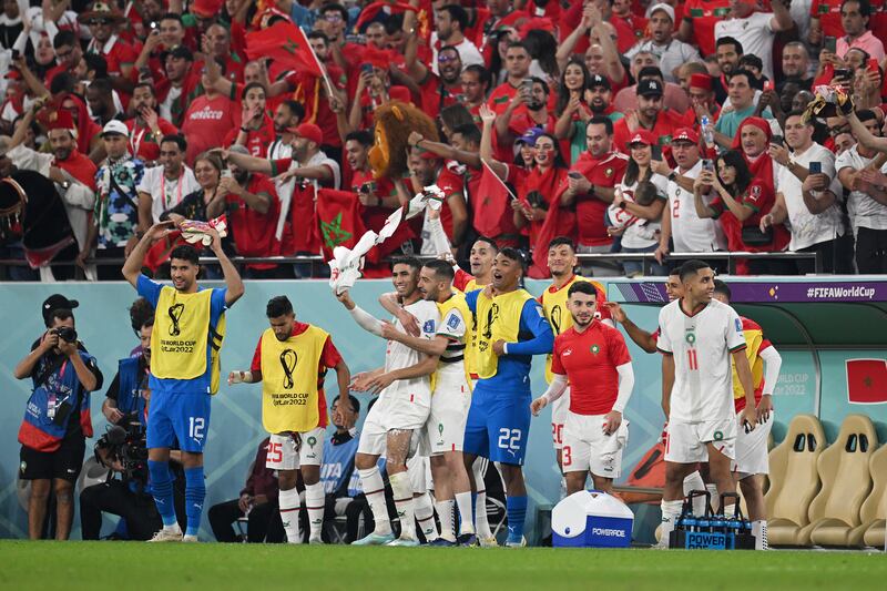 Morocco players celebrate after the match. Getty