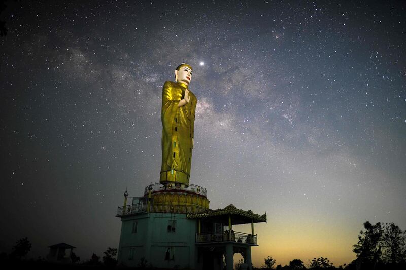 The Milky Way behind a statue of the Buddha in Taikkyi, Myanmar. AFP