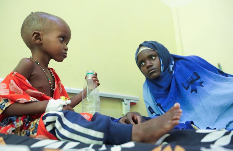 Jamila Omar, 3, and her mother Amina Mohamed in Banadir Hospital in Mogadishu, Somalia.