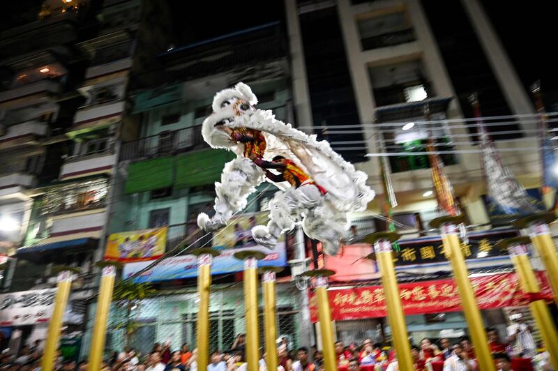 A lion dance performance to mark the Lunar New Year in Yangon's Chinatown district. AFP