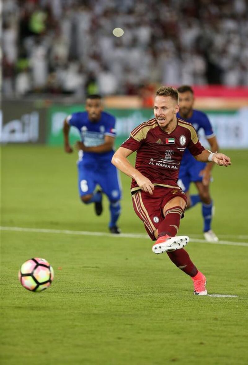 Balazs Dzsudzsak takes the penalty that leads to Al Wahda’s opening goal.