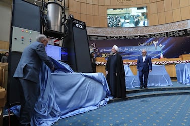 Iranian president Hassan Rouhani and head of Iran's nuclear technology organisation Ali Akbar Salehi unveiling nuclear technology achievements during the National Nuclear Technology Day in Tehran, Iran. EPA