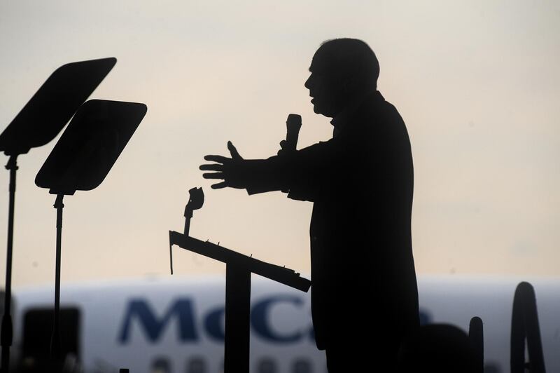 (FILES) In this file photo taken on November 03, 2008 Republican presidential candidate Arizona Senator John McCain speaks at a campaign rally at the airport in Moon Township, Pennsylvania. - US senator John McCain, a celebrated war hero known for reaching across the aisle in an increasingly divided America, died August 25, 2018 after losing a battle to brain cancer, his office said. He was 81. "Senator John Sidney McCain III died at 4:28pm on August 25, 2018. With the senator when he passed were his wife Cindy and their family," his office said in a statement. "At his death, he had served the United States of America faithfully for 60 years." (Photo by Robyn BECK / AFP)
