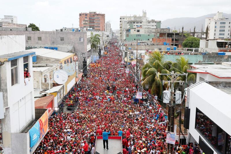 A handout photo made available by Miraflores shows Venezuelan President Nicolas Maduro taking part in a campaign event in Margarita, Venezuela. Miraflores / EPA