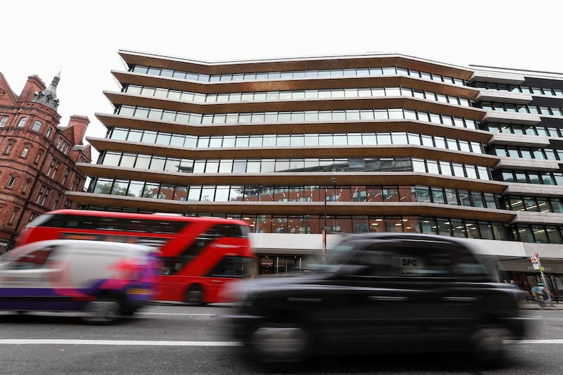 Traffic passes the offices which house the headquarters of Bell Pottinger LLP in London, U.K., on Tuesday, Sept. 5, 2017. Bell Pottinger LLP's attempt to sell itself has reportedly collapsed amid an exodus of clients and staff, succumbing to an unprecedented backlash over the London public-relations firm's involvement in a racially divisive social-media campaign the company ran in South Africa. Photographer: Chris Ratcliffe/Bloomberg