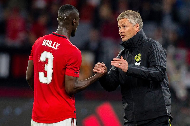 Solskjaer with Eric Bailly. EPA