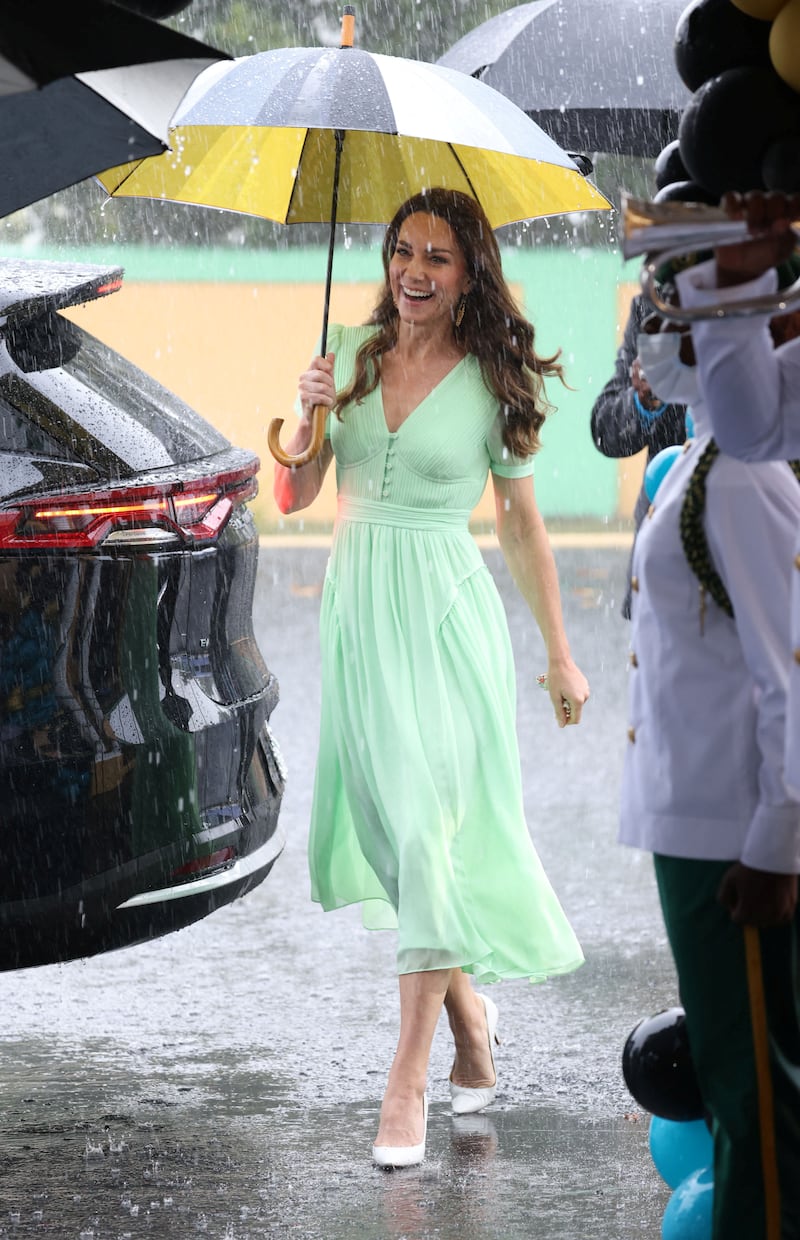 The Duchess of Cambridge, wearing pale green Self Portrait, visits Sybil Strachan Primary School in Nassau, Bahamas on March 25. Reuters 