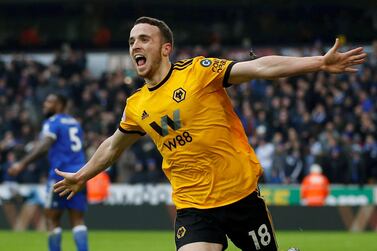 Soccer Football - Premier League - Wolverhampton Wanderers v Leicester City - Molineux Stadium, Wolverhampton, Britain - January 19, 2019 Wolverhampton Wanderers' Diogo Jota celebrates scoring their fourth goal to complete his hat-trick Action Images via Reuters/Craig Brough EDITORIAL USE ONLY. No use with unauthorized audio, video, data, fixture lists, club/league logos or "live" services. Online in-match use limited to 75 images, no video emulation. No use in betting, games or single club/league/player publications. Please contact your account representative for further details. TPX IMAGES OF THE DAY