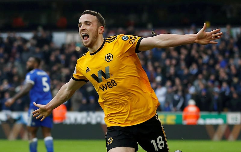 Soccer Football - Premier League - Wolverhampton Wanderers v Leicester City - Molineux Stadium, Wolverhampton, Britain - January 19, 2019  Wolverhampton Wanderers' Diogo Jota celebrates scoring their fourth goal to complete his hat-trick   Action Images via Reuters/Craig Brough  EDITORIAL USE ONLY. No use with unauthorized audio, video, data, fixture lists, club/league logos or "live" services. Online in-match use limited to 75 images, no video emulation. No use in betting, games or single club/league/player publications.  Please contact your account representative for further details.     TPX IMAGES OF THE DAY