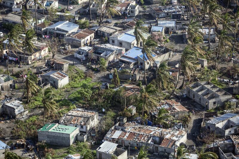 Debris and destroyed buildings from the cyclone stand in a residential neighbourhood in this aerial photograph over Beira, Mozambique, on Wednesday, March 27, 2019. Cyclone Idai hit the Mozambican coast earlier this month, devastating the port city of Beira and killing at least 700 people in Mozambique, Zimbabwe and Malawi. Photographer: Guillem Sartorio/Bloomberg