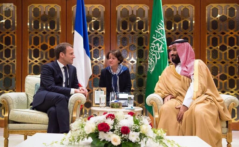 In this Thursday, Nov. 9, 2017, photo released by Saudi Press Agency, SPA, Saudi Crown Prince Mohammed bin Salman, right, meets with French President Emmanuel Macron upon his arrival in Riyadh, Saudi Arabia. (Saudi Press Agency via AP)