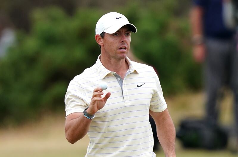 Rory McIlroy celebrates his birdie on the 10th. PA
