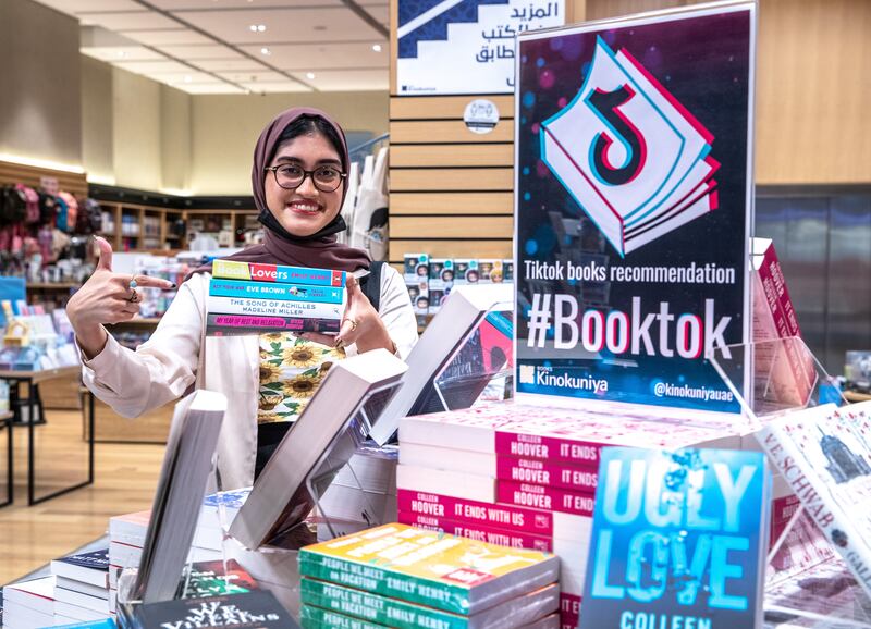 Lubna picks a selection of books at Kinokuniya, Abu Dhabi, that come highly recommended on BookTok. All photos: Victor Besa / The National