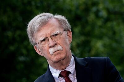 (FILES) In this file photo taken on May 01, 2019 National Security Advisor John Bolton speaks to Fox News outside the White House in Washington, DC. The United States is sending an aircraft carrier strike group and a bomber task force to the Middle East in a "clear and unmistakable" message to Iran, National Security Advisor John Bolton said May 5, 2019. / AFP / Brendan Smialowski
