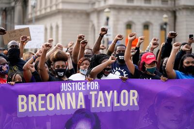 FILE - In this Sept. 25, 2020, file photo, Black Lives Matter protesters march in Louisville. Hours of material in the grand jury proceedings for Taylorâ€™s fatal shooting by police have been made public on Friday, Oct. 2. (AP Photo/Darron Cummings, File)